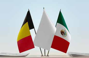 Flags of Belgium and Mexico with a white flag in the middle