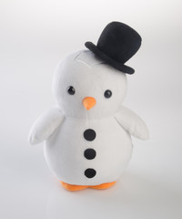 toy or funny handmade toy penguins on background.