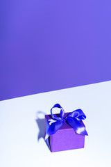 purple present with bow, ultra violet trend