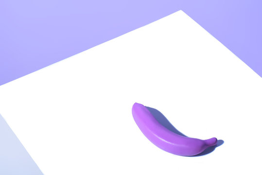 Plastic Purple Banana On White Surface