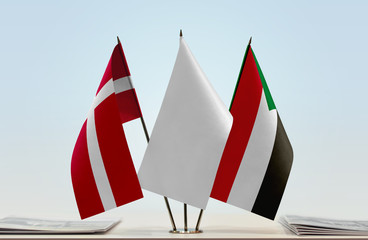 Flags of Denmark and Sudan with a white flag in the middle