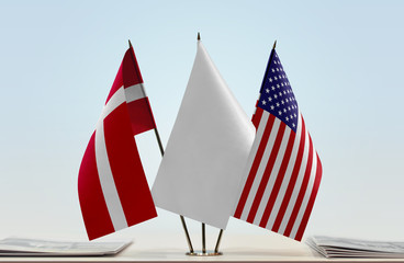 Flags of Denmark and USA with a white flag in the middle