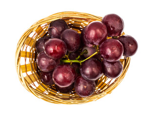 Bunch of red grapes on plate