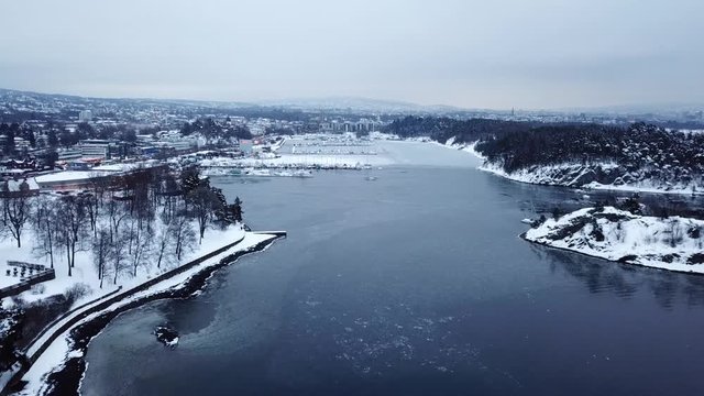 Aerial shot of flying a drone between the islands in Oslofjord, Norway