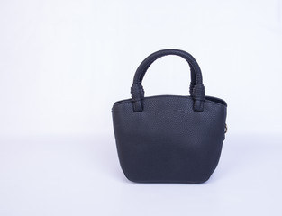 bag or black colour female bag on a background.