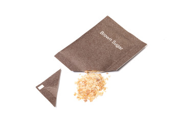 Brown sugar packet on white background 