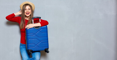Smiling happy woman with travel suitcase. © Yuriy Shevtsov