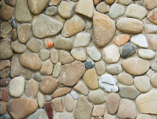 Decorative modern stone wall of chipped stone for background