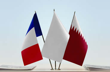 Fototapeta premium Flags of France and Qatar with a white flag in the middle