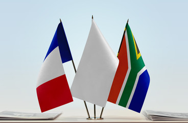 Flags of France and Republic of South Africa with a white flag in the middle