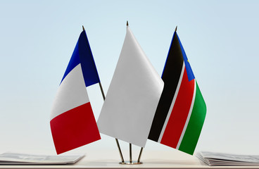 Flags of France and South Sudan with a white flag in the middle