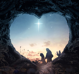 Christmas religious nativity concept: Silhouette mother Mary and father Joseph looking Jesus born in birth manger on Christmas Eve - 3d illustration - obrazy, fototapety, plakaty