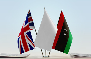 Flags of United Kingdom and Libya with a white flag in the middle