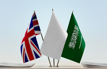 Flags of United Kingdom and Saudi Arabia with a white flag in the middle