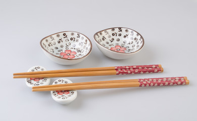 chinese chopsticks or chopsticks set on a background.