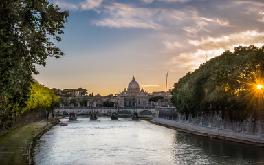 Naklejka premium The Tiber river in Rome at the sunset
