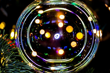 Abstract beautiful christmas lights and ornaments  in a tree