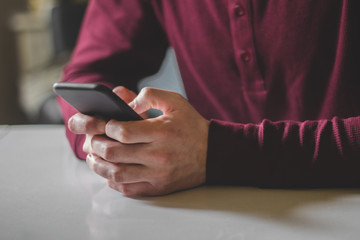 Close-up Photo Of Man Holding Cellphone