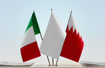 Flags of Italy and Bahrain with a white flag in the middle