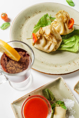 stuffed pancakes with sauce