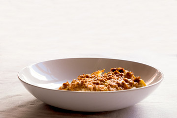 close up of isolated dish of italian lasagna on white background