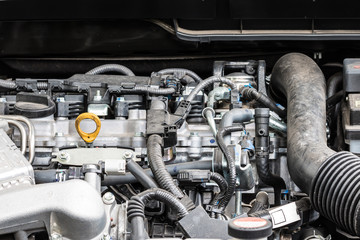 Engine of a modern car, closeup on detail parts.