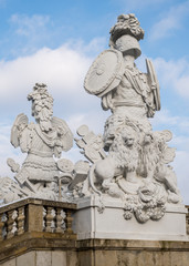 Fototapeta na wymiar Old baroque statues in a park in Vienna