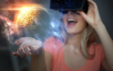 Fototapeta premium woman in virtual reality headset or 3d glasses