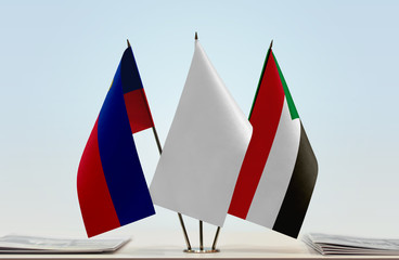 Flags of Liechtenstein and Sudan with a white flag in the middle