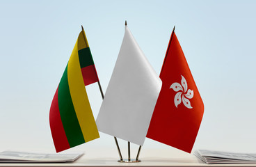 Flags of Lithuania and Hong Kong with a white flag in the middle