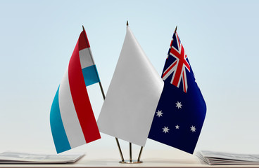 Flags of Netherlands and Australia with a white flag in the middle