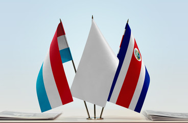 Flags of Netherlands and Costa Rica with a white flag in the middle