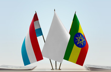 Flags of Netherlands and Ethiopia with a white flag in the middle