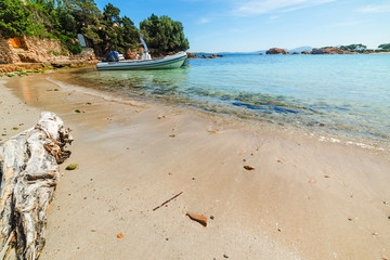 Rubber boat in a small cove in Sardinia