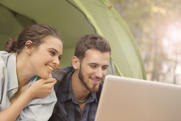 Young couple using a pc