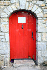 wooden retro red door with free note paper for texture