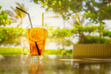 A refreshing cocktail at the tropical beach bar on a hot Sunny day.