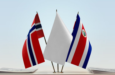 Flags of Norway and Costa Rica with a white flag in the middle