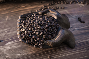 hands and coffee and wood