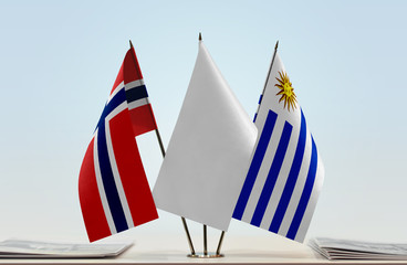 Flags of Norway and Uruguay with a white flag in the middle