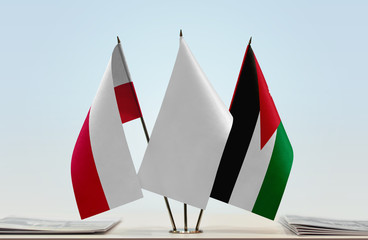 Flags of Poland and Jordan with a white flag in the middle