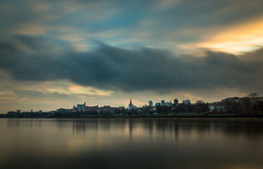 Fototapeta premium Sunset on the Vistula and downtown of Warsaw, Poland
