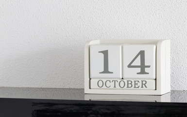 White block calendar present date 14 and month October