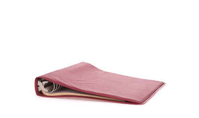 Old red ring binder isolated