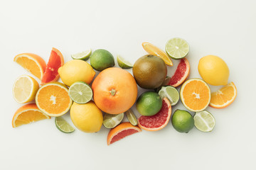 Assorted raw citruses isolated on white background