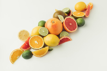 Pile of ripe citruses isolated on white background