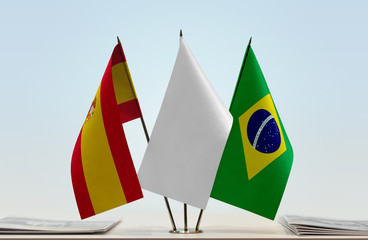 Flags of Spain and Brazil with a white flag in the middle