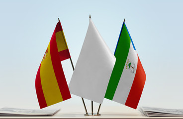 Flags of Spain and Equatorial Guinea with a white flag in the middle