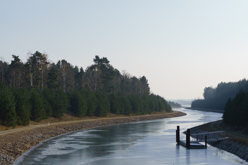 Winter view of Sornoer Canal. Canal connect lakes Geierswalder See and Sedlitzer See. The surroundings of Senftenberg. Germany. Federal state of Brandenburg.
