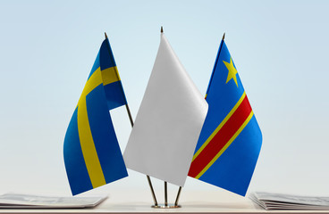 Flags of Sweden and Democratic Republic of the Congo (DRC, DROC, Congo-Kinshasa) with a white flag in the middle